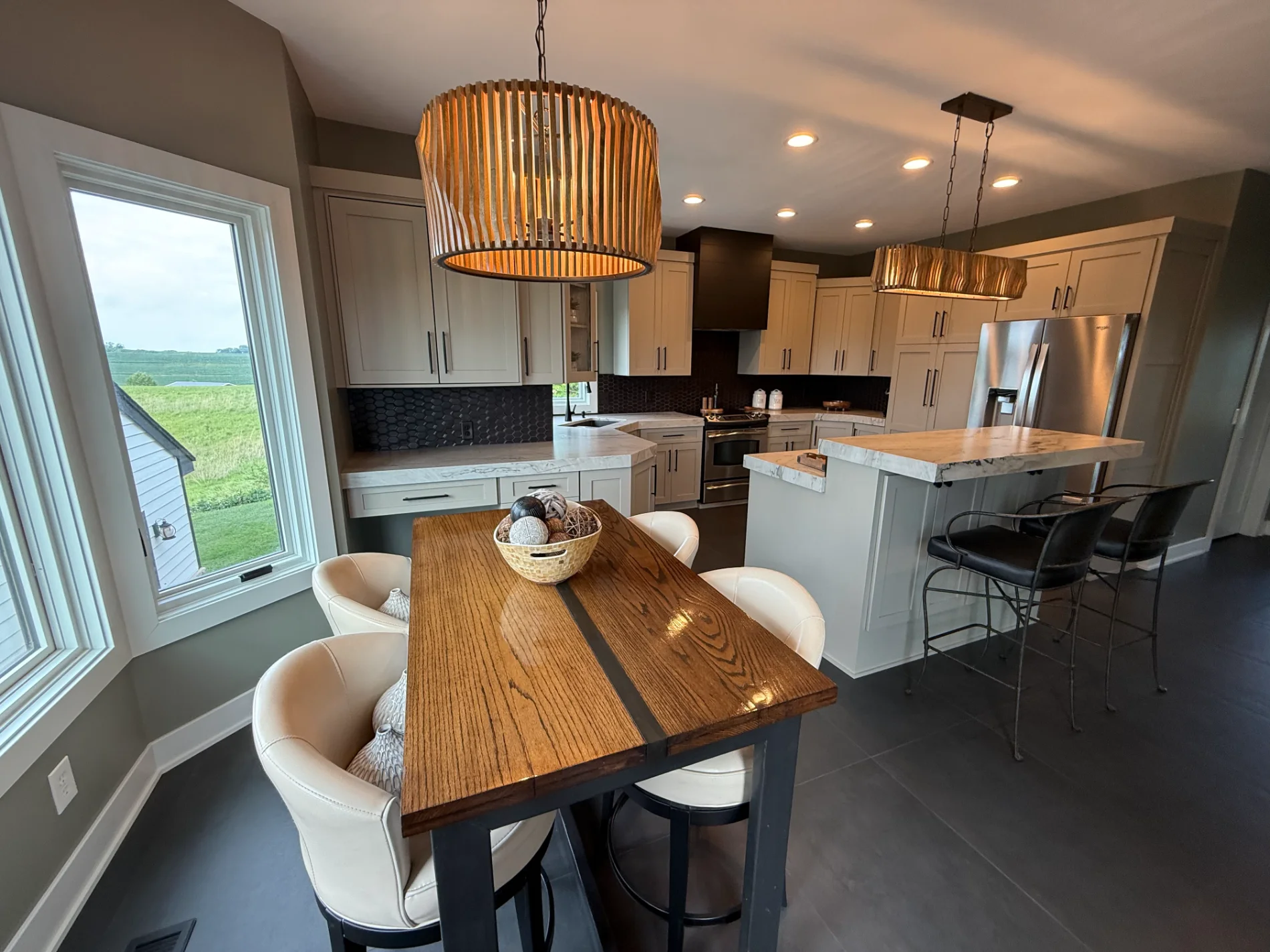 Finished kitchen remodel by Verespej Construction in Omaha, NE — custom cabinetry and stone countertops